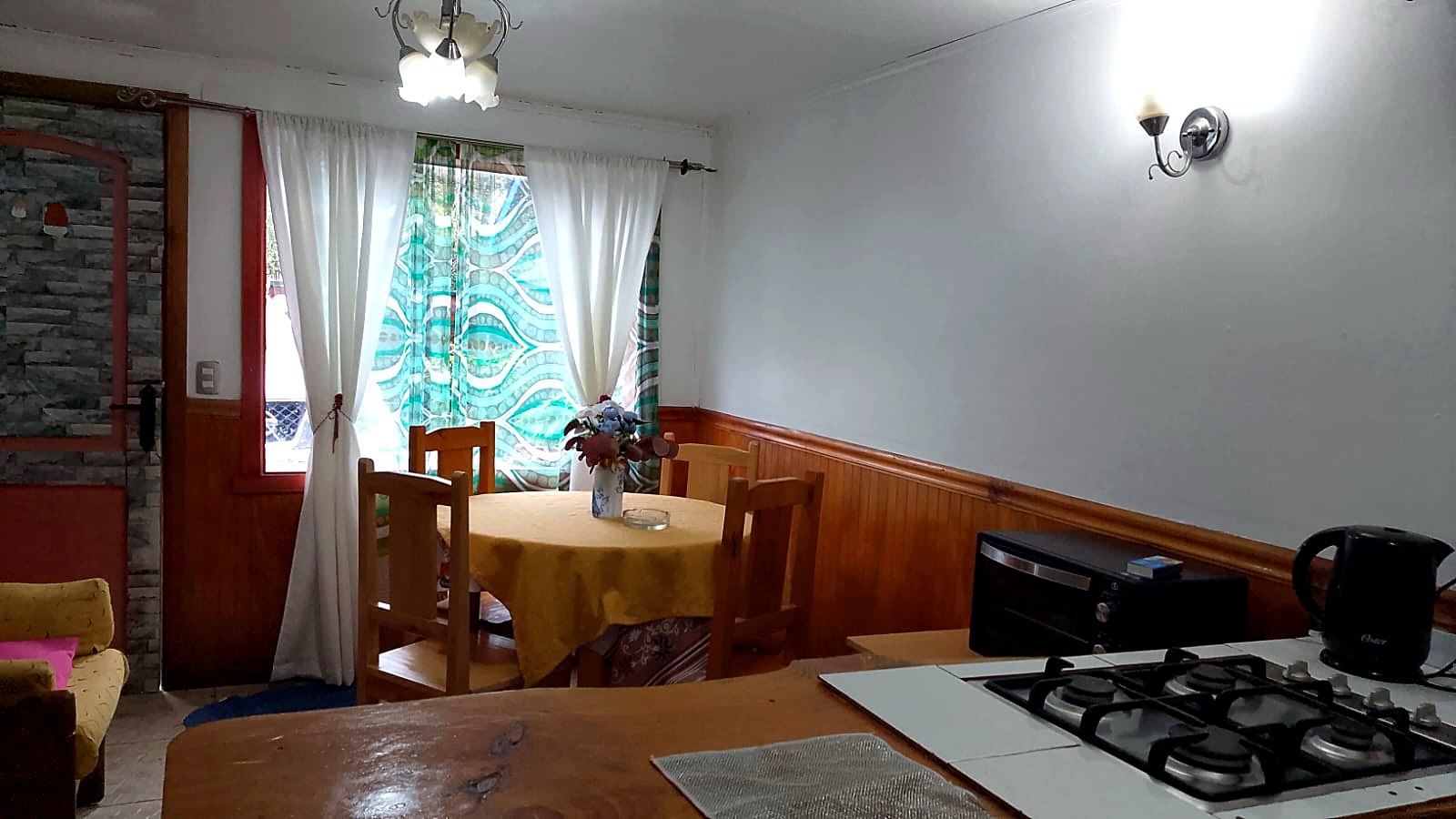 Comedor y living del departamento